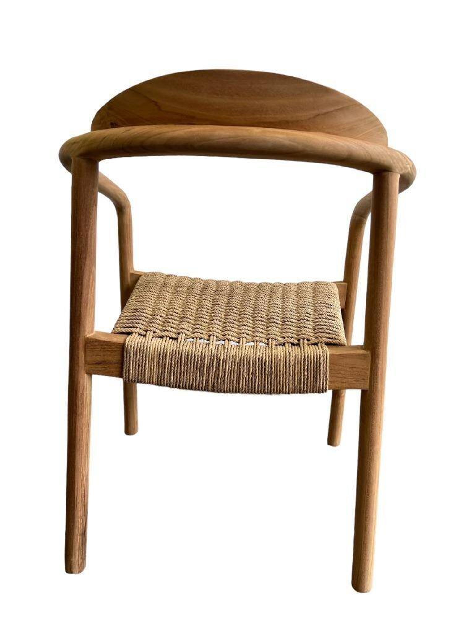 solid wood chair with woven seat and armrests
