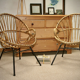 Paire de fauteuils corbeille en osier et rotin 1960