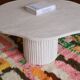 Organic shape travertine coffee table
