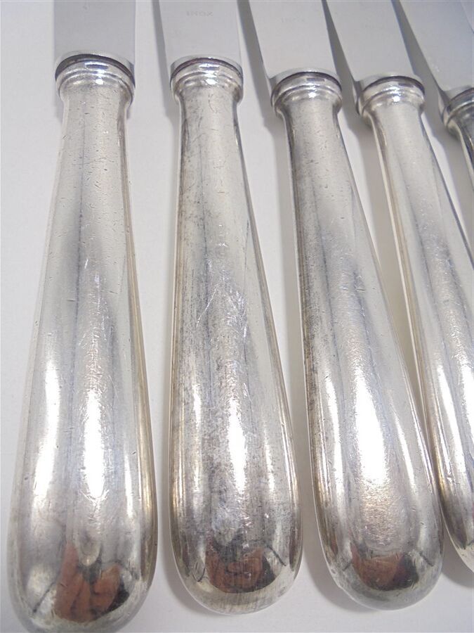 Series of 12 silver knives