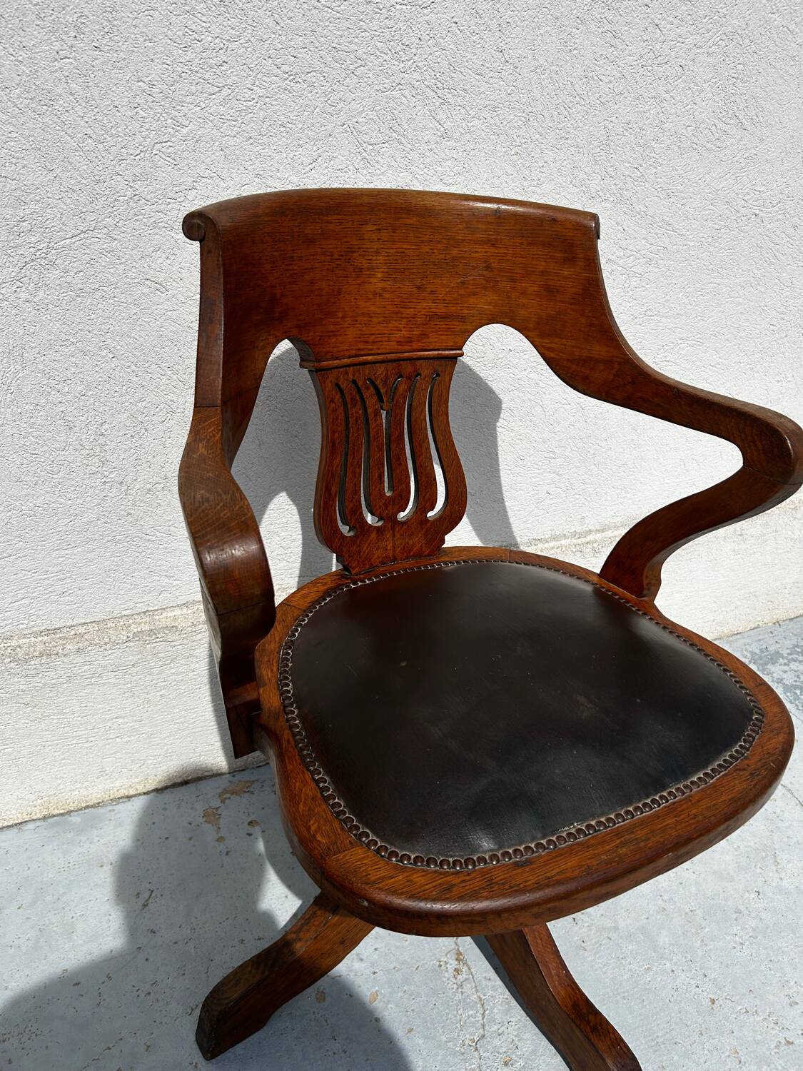 Milwaukee Chair Co. swivel office chair – leather and wood – circa