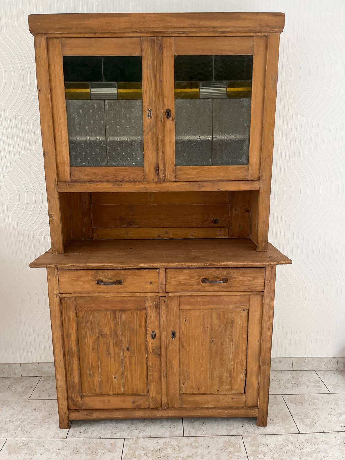 Antique dresser with glass doors and fleur-de-lys from the 50s
