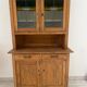 Antique dresser with glass doors and fleur-de-lys from the 50s