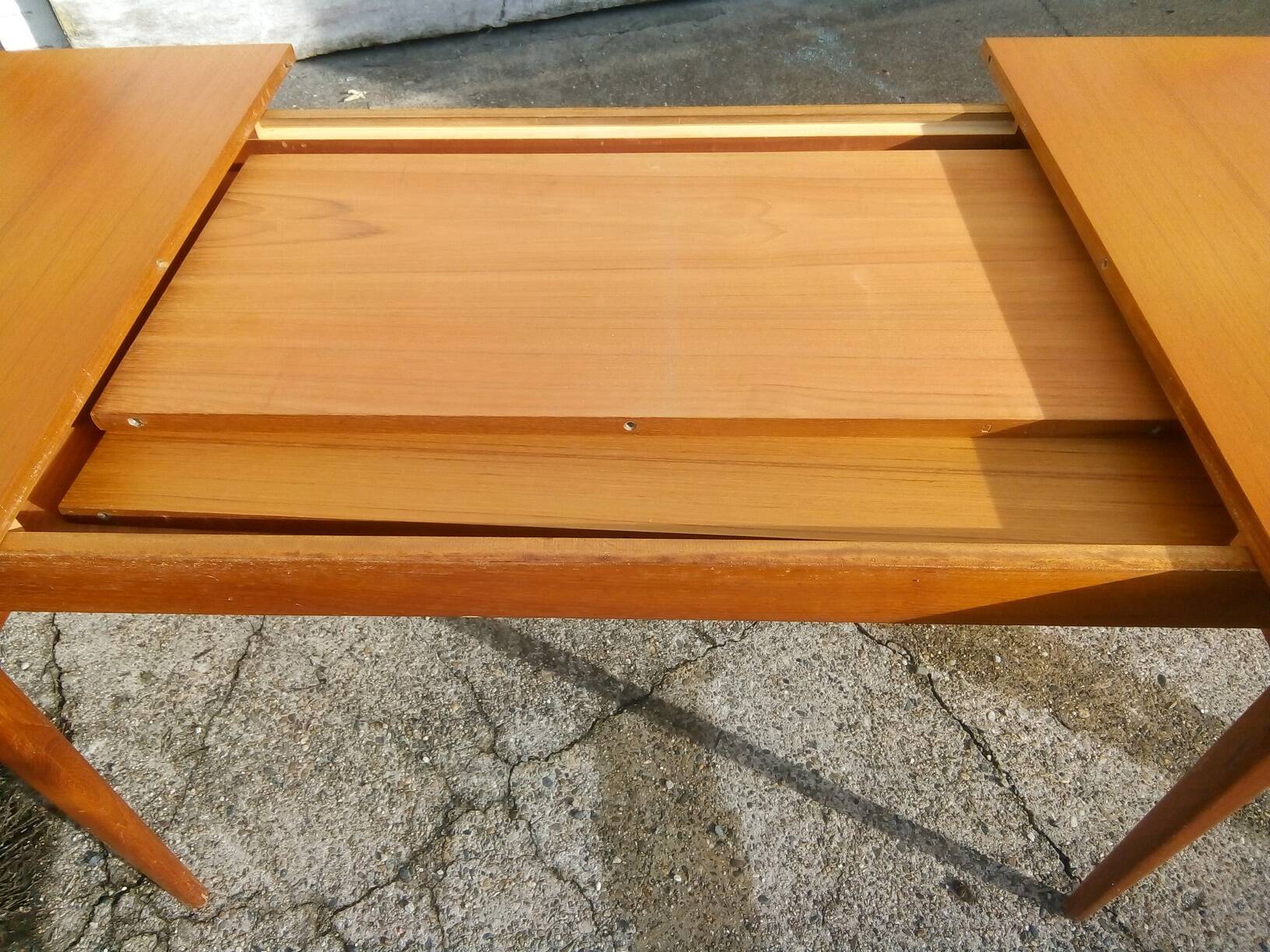 Danish Scandinavian teak dining table with extensions