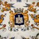 Handled coupe in Gien earthenware with heraldic and fantastic decoration.