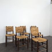 Set of 10 Bauche model chairs by Charlotte Perriand, circa 1960.