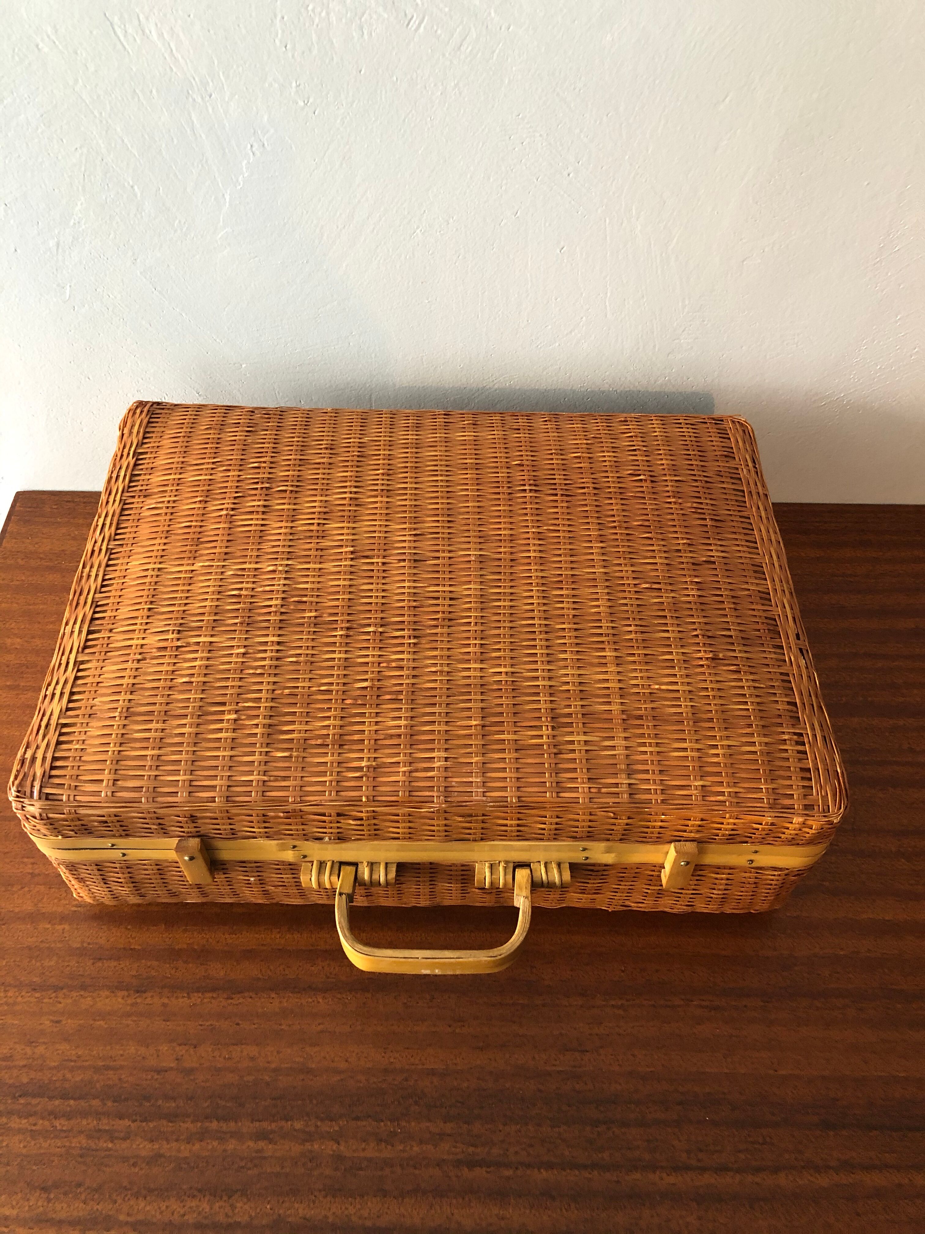Vintage braided wicker suitcase