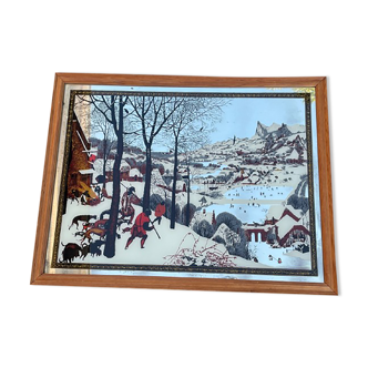 Vintage mirror painted hunters in the snow after painting by Pieter Bruegel the Elder (1565)