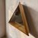 Vintage shallow wall display cabinet with a mirrored back.