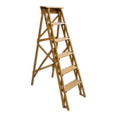 Vintage wooden painter's step ladder with a patina.