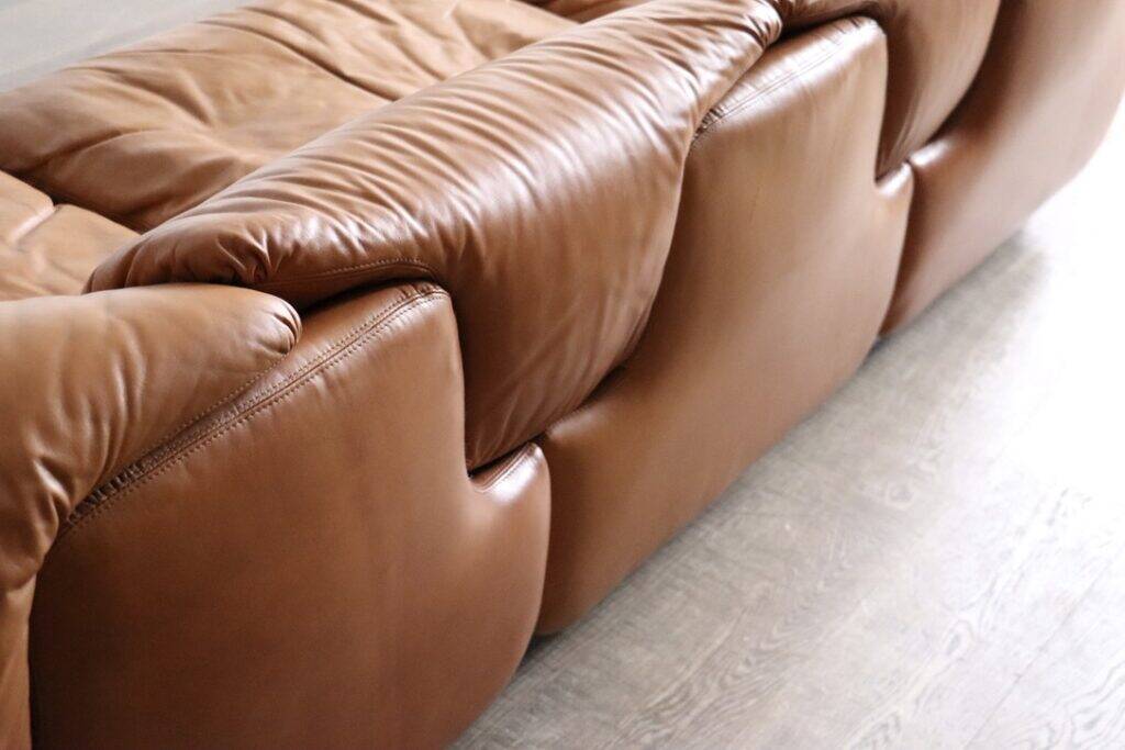 Confidential sofa by Alberto Rosselli for Saporiti in cognac leather, Italy 1970s