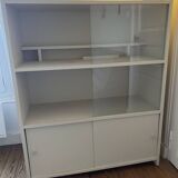 Beige wooden bookshelf