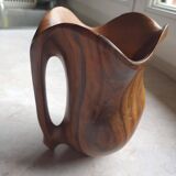 Olive wood pitcher.