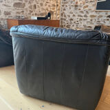 Pair of black leather armchairs from the 80s