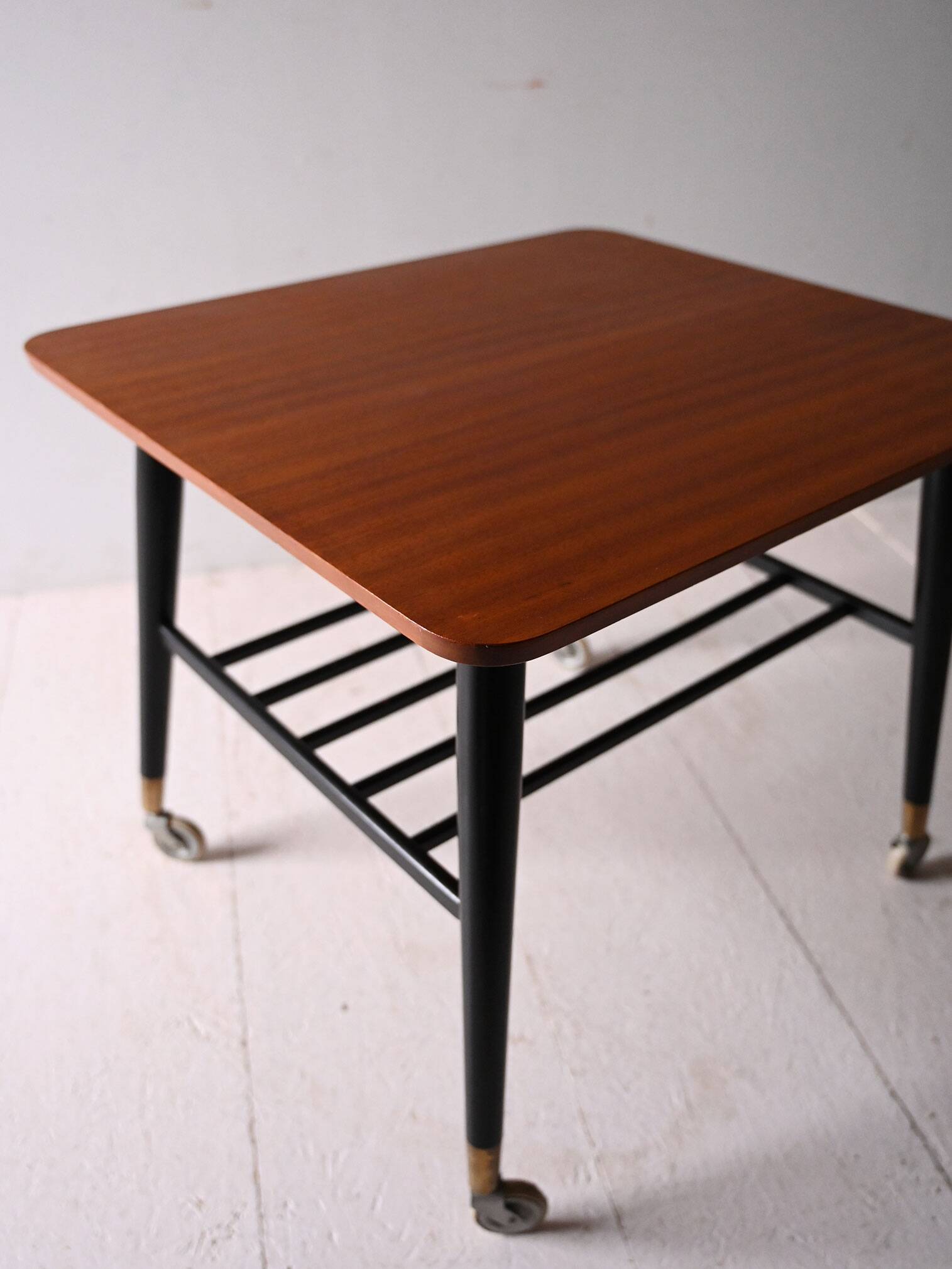 Vintage Scandinavian teak coffee table with castors
