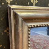 Louis XVI mirror with gold leaf