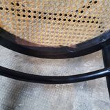 Curved wood and cane armchair called "Le Corbusier"
