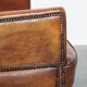 Amazing cognac-coloured sheepskin dining/side chair with armrests
