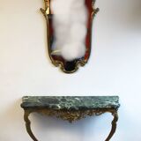 Bronze wall console and mirror.