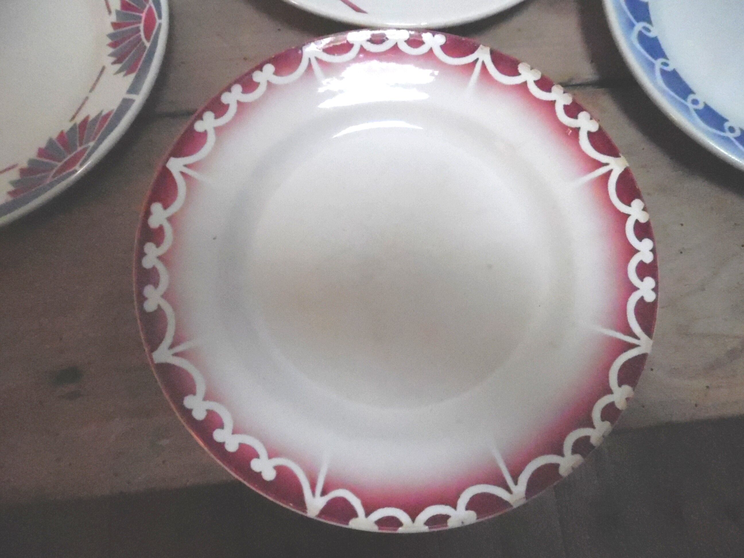 Six plates mismatched earthenware