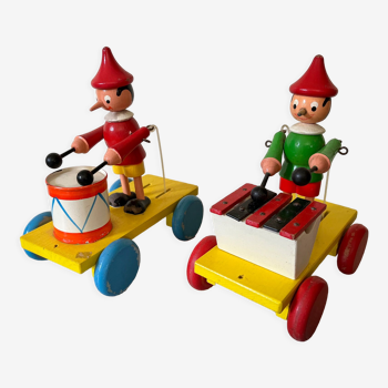 Lot de 2 jouets à tirer en bois "Pinocchio musicien" vintage