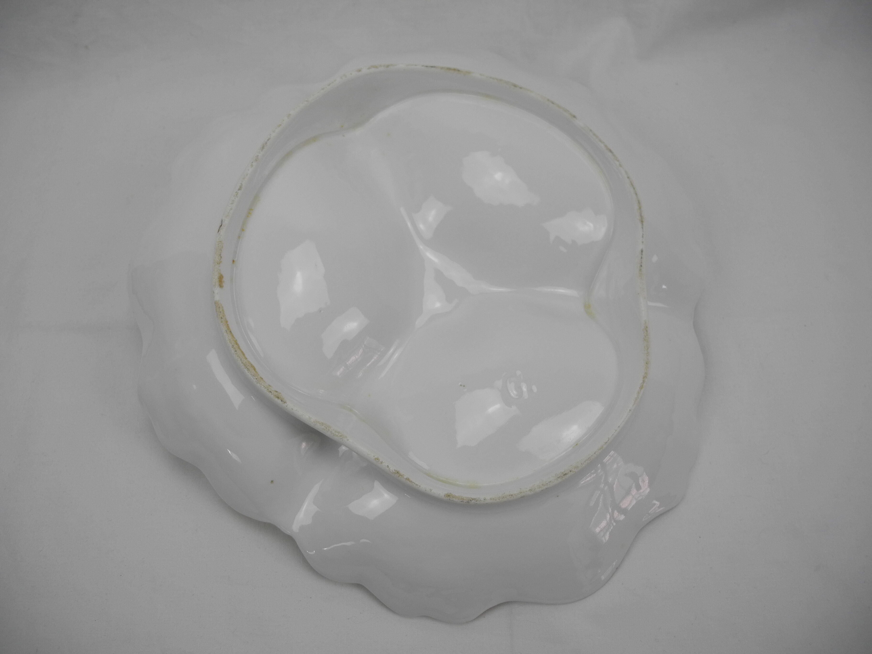 Old porcelain beggar serving dish