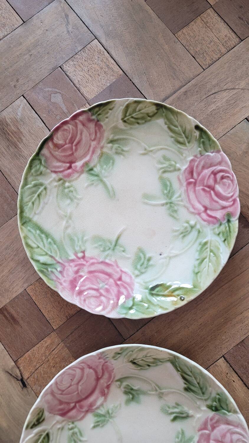 4 pink earthenware plates