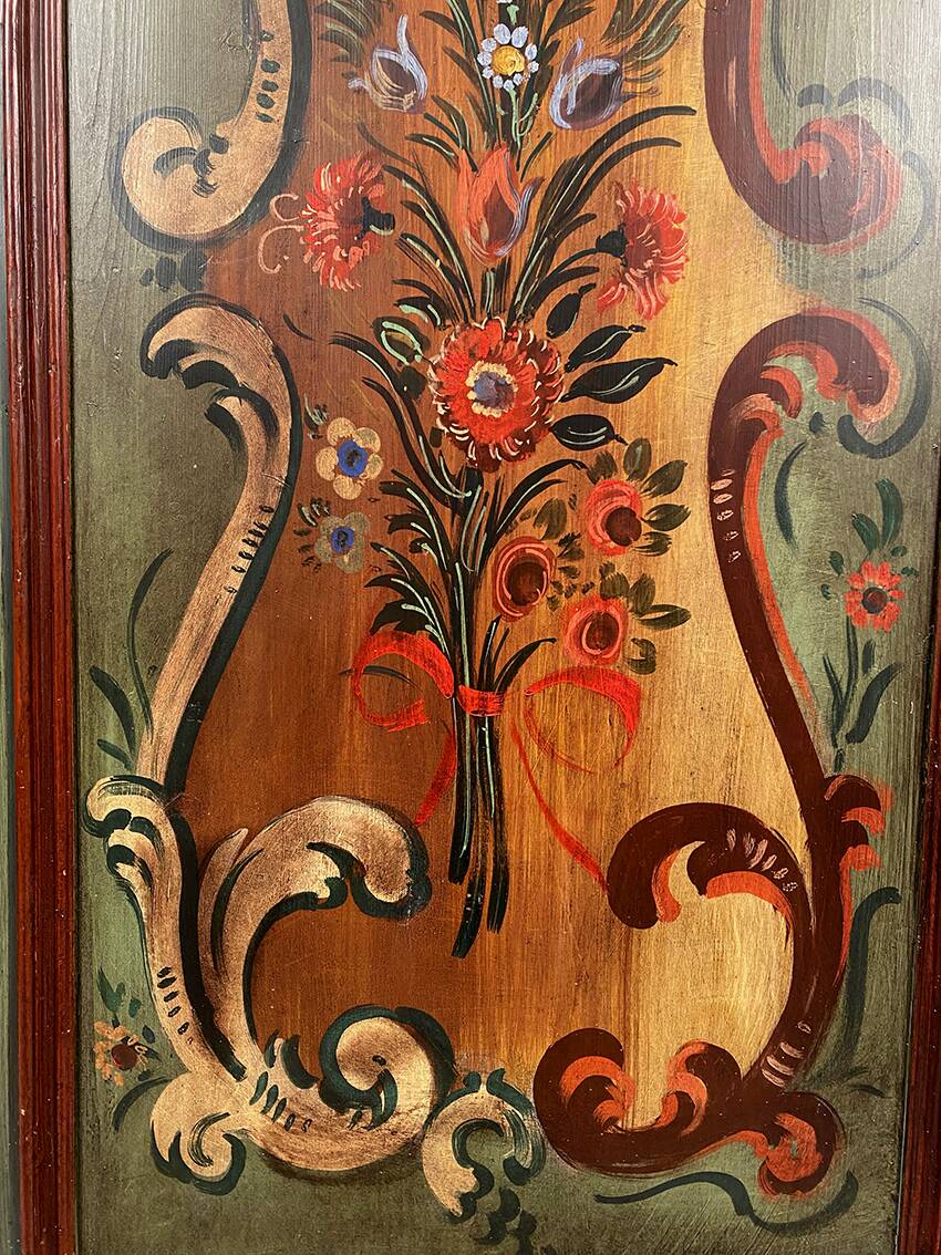 Alsatian bonnet maker in painted softwood with floral decorations