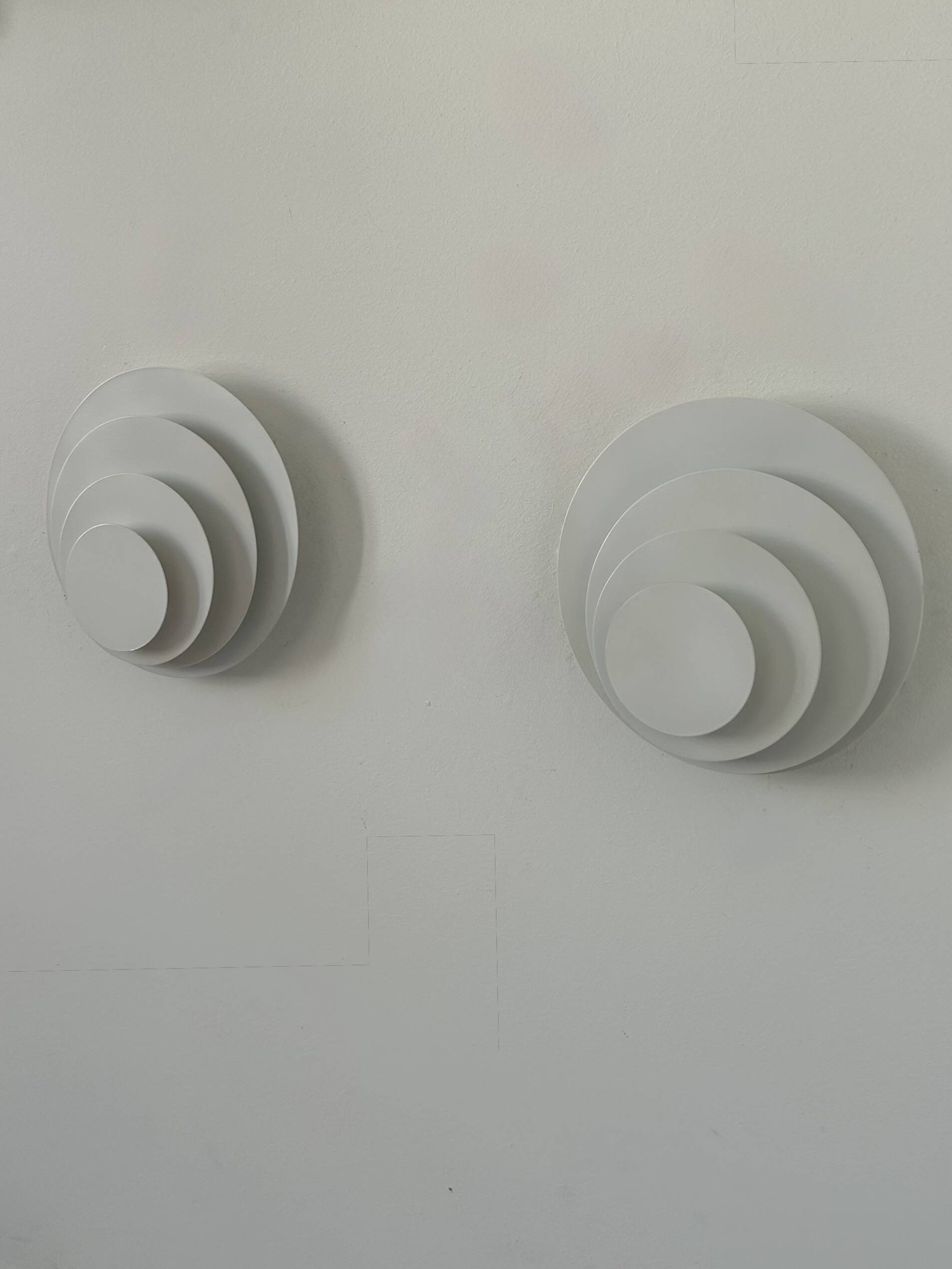 Pair of vintage wall lights, matte white metal, France, 1980.