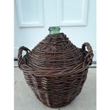 Demijohn in its wicker case