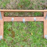 Wall-mounted coat rack with vintage hooks