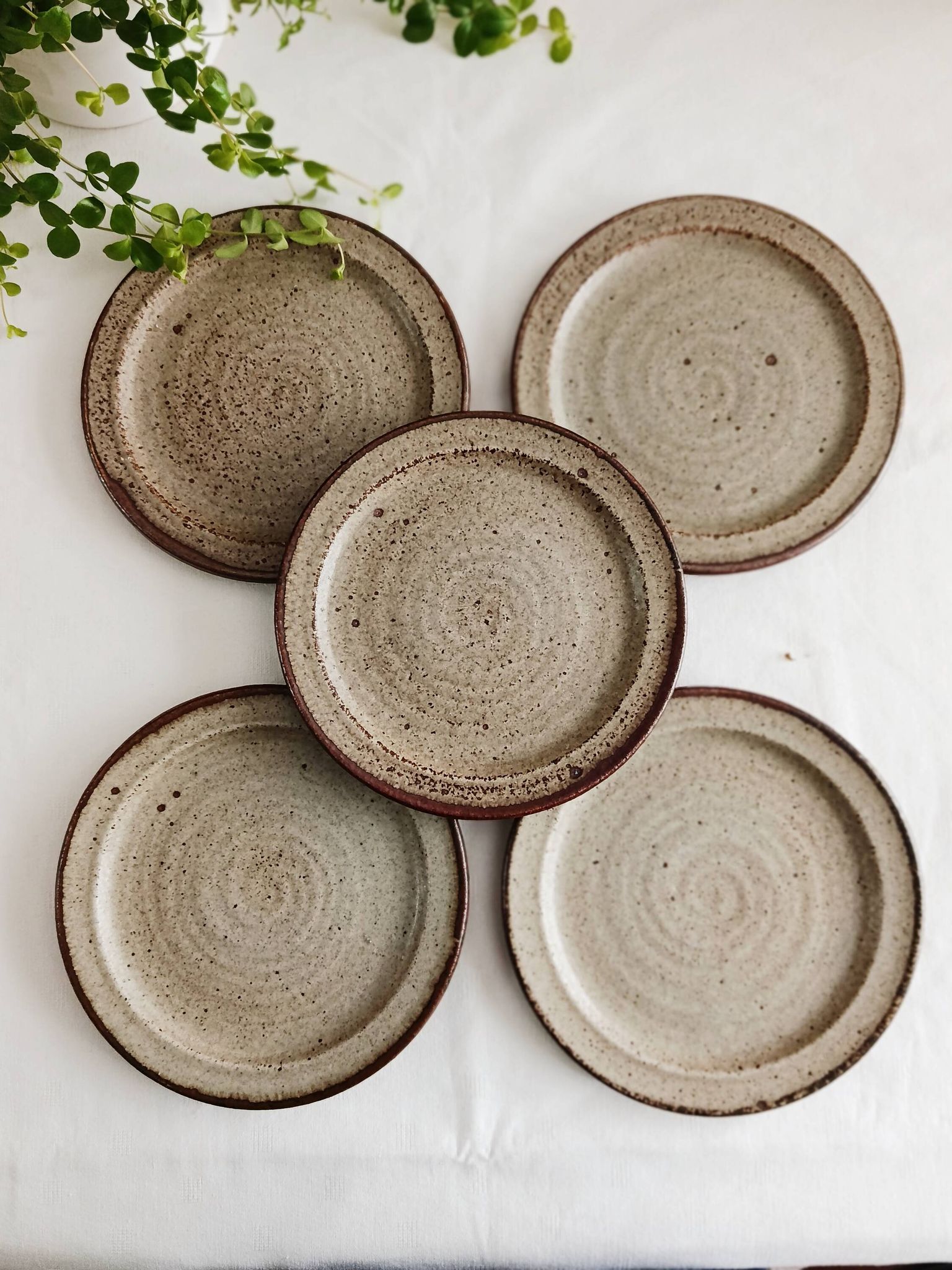 Set of 5 dessert plates by Jean Tessier, Le Cep, in pyrite stoneware.