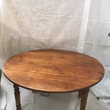 Table en bois ovale à volet