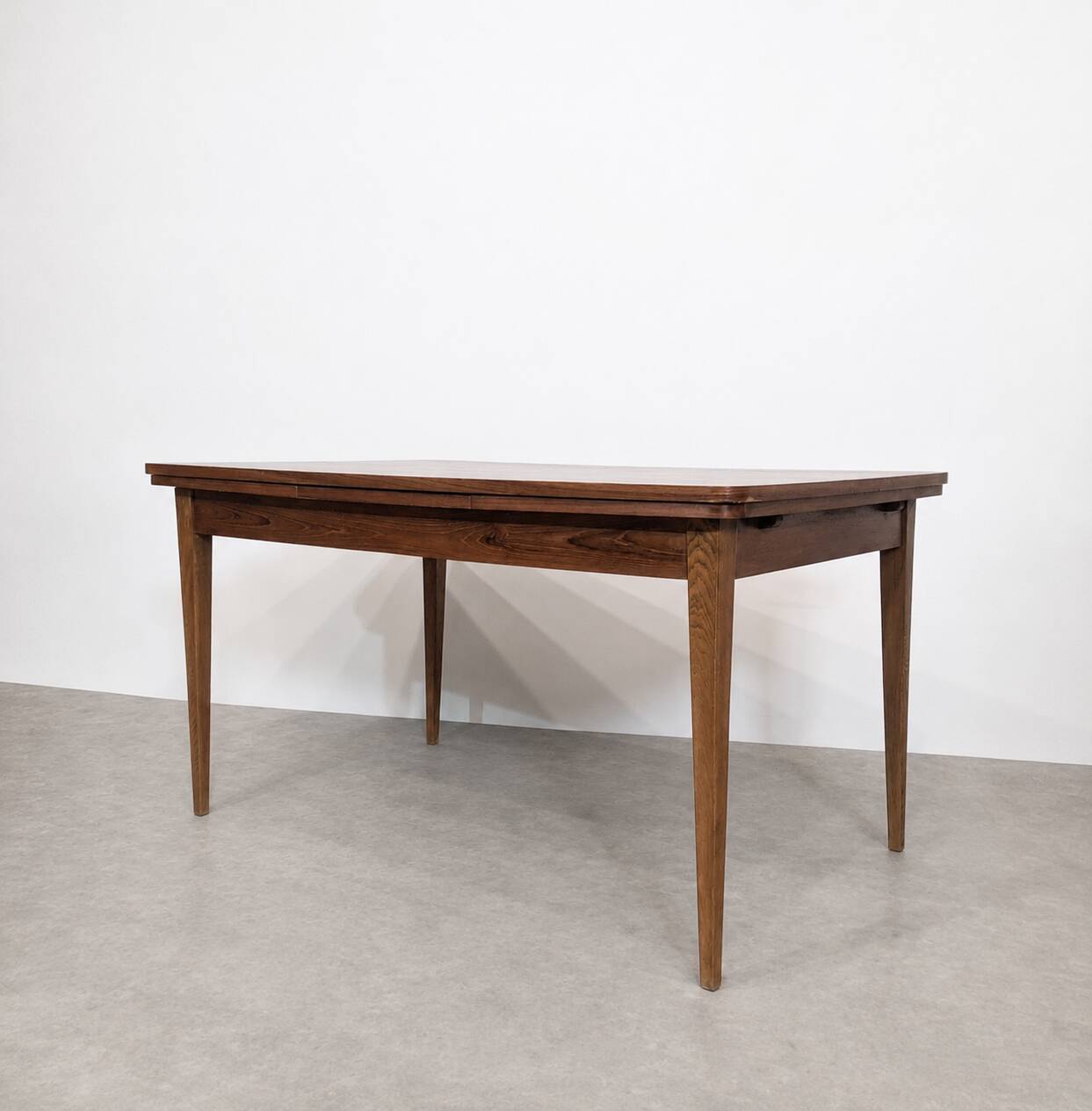 Scandinavian extendable dining table in teak, circa 1960.