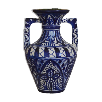 White hand-painted ceramic vase with blue patterns