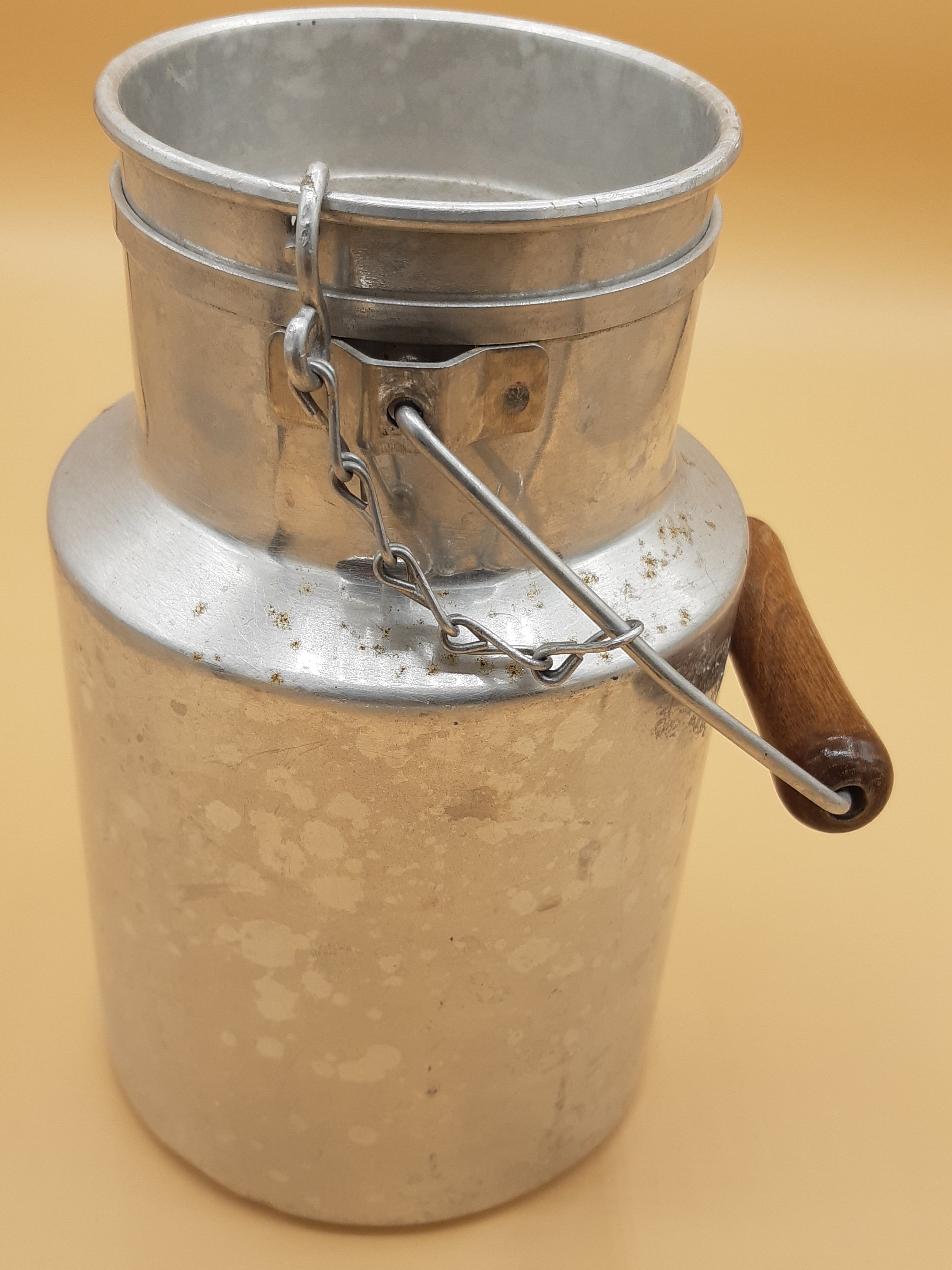 Old aluminum milk jars, wooden handle, lot of 2