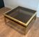 Table basse en laiton et laque noire de Guy Lefèvre pour la Maison Jansen