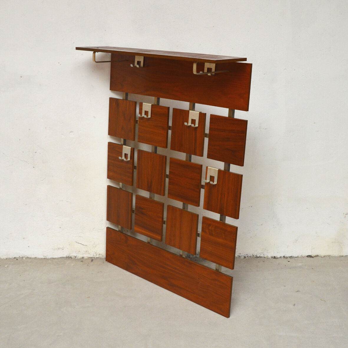 Wall-mounted coat hanger, 1960