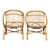 Pair of 1950s rattan armchairs from France.