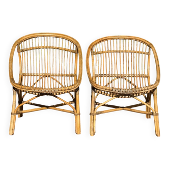 Pair of 1950s rattan armchairs from France.