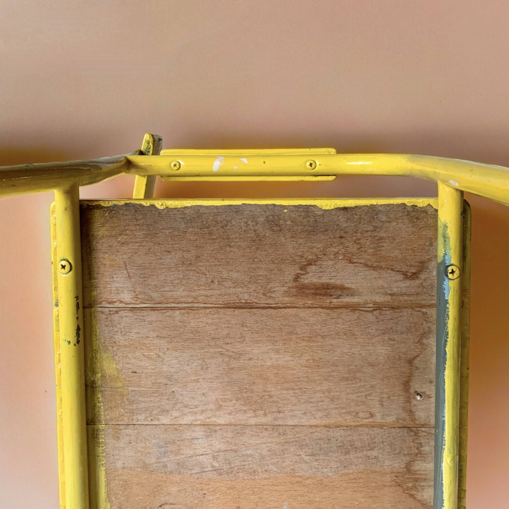 Vintage children's chair in yellow painted wood and metal