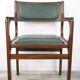 60s armchair in wood and dark green imitation leather