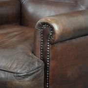 Set of two characterful sheepskin armchairs with a beautiful deep colour