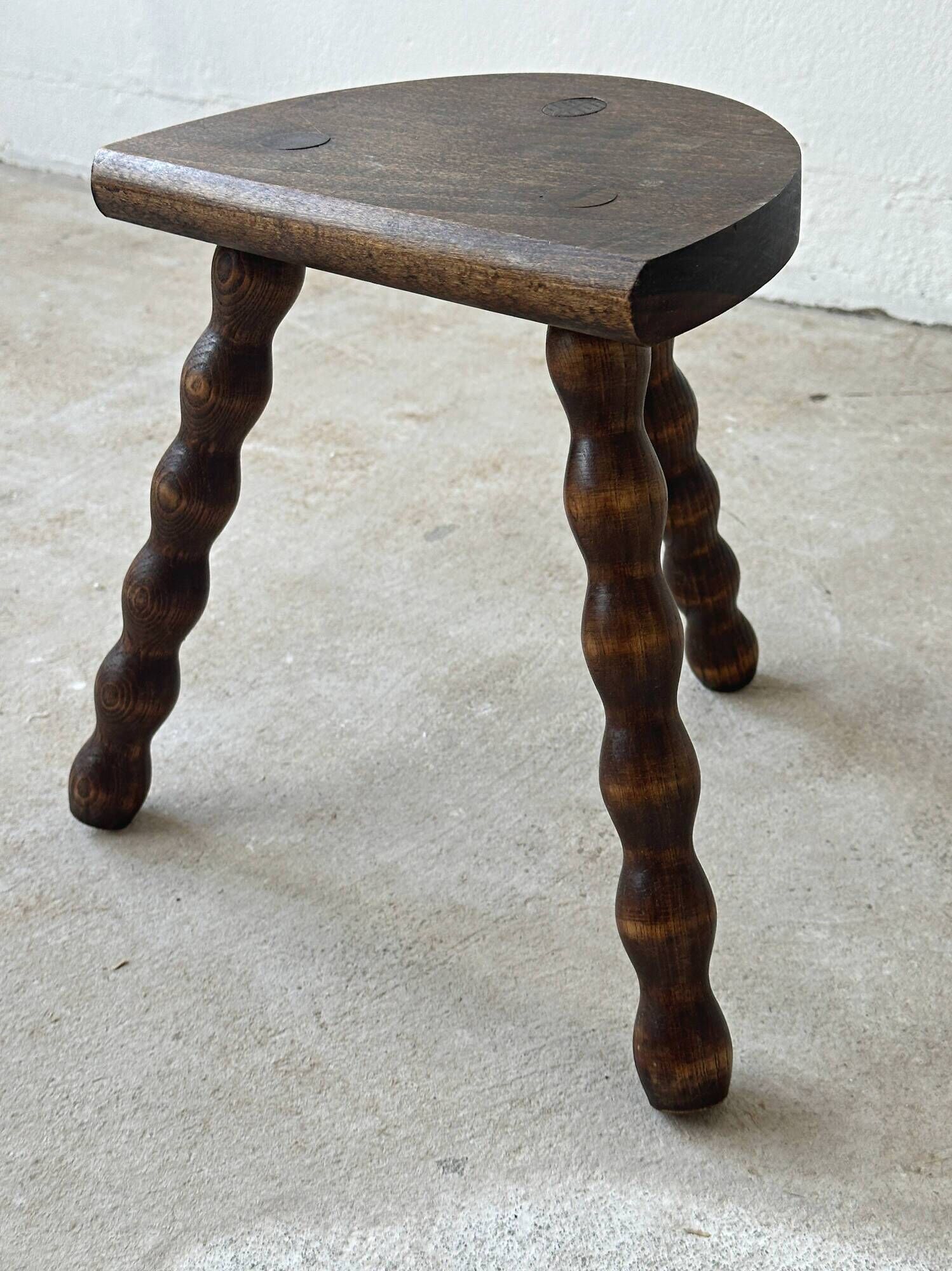 2 antique solid wood stools with turned legs