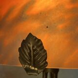 Contemporary mushroom lamp, wrought iron base and orange glass shell with blue hues in the art deco style