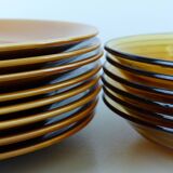 Set of 8 ocher enameled ceramic dinner plates