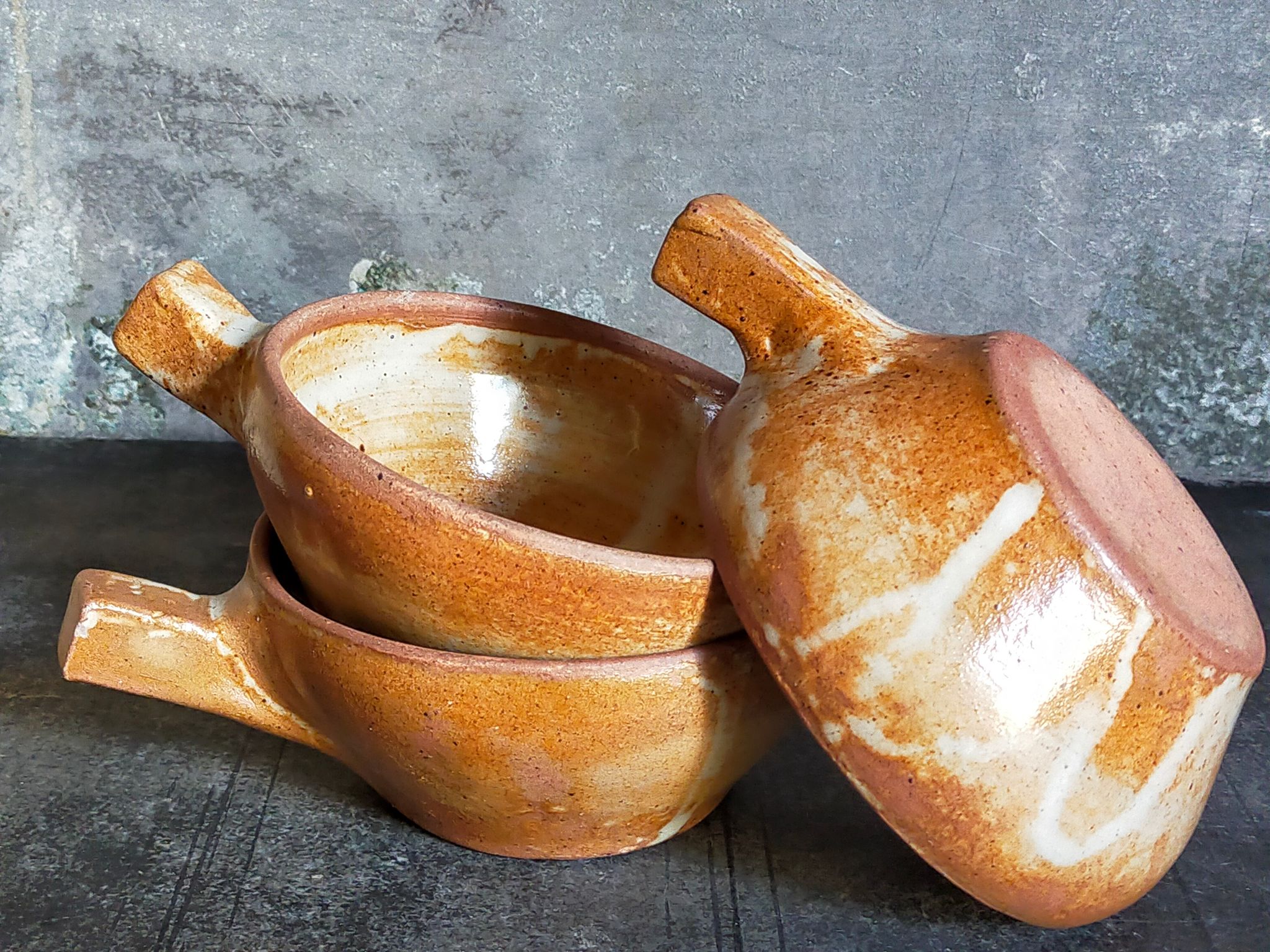 Three vintage marais sandstone bowls