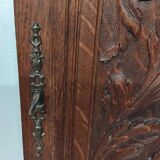 Paire d'anciens panneaux de porte en bois chêne sculpté