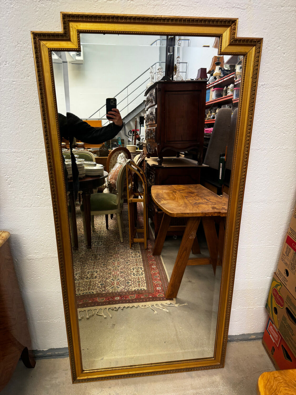 Large gold mirror in the Louis XVI style