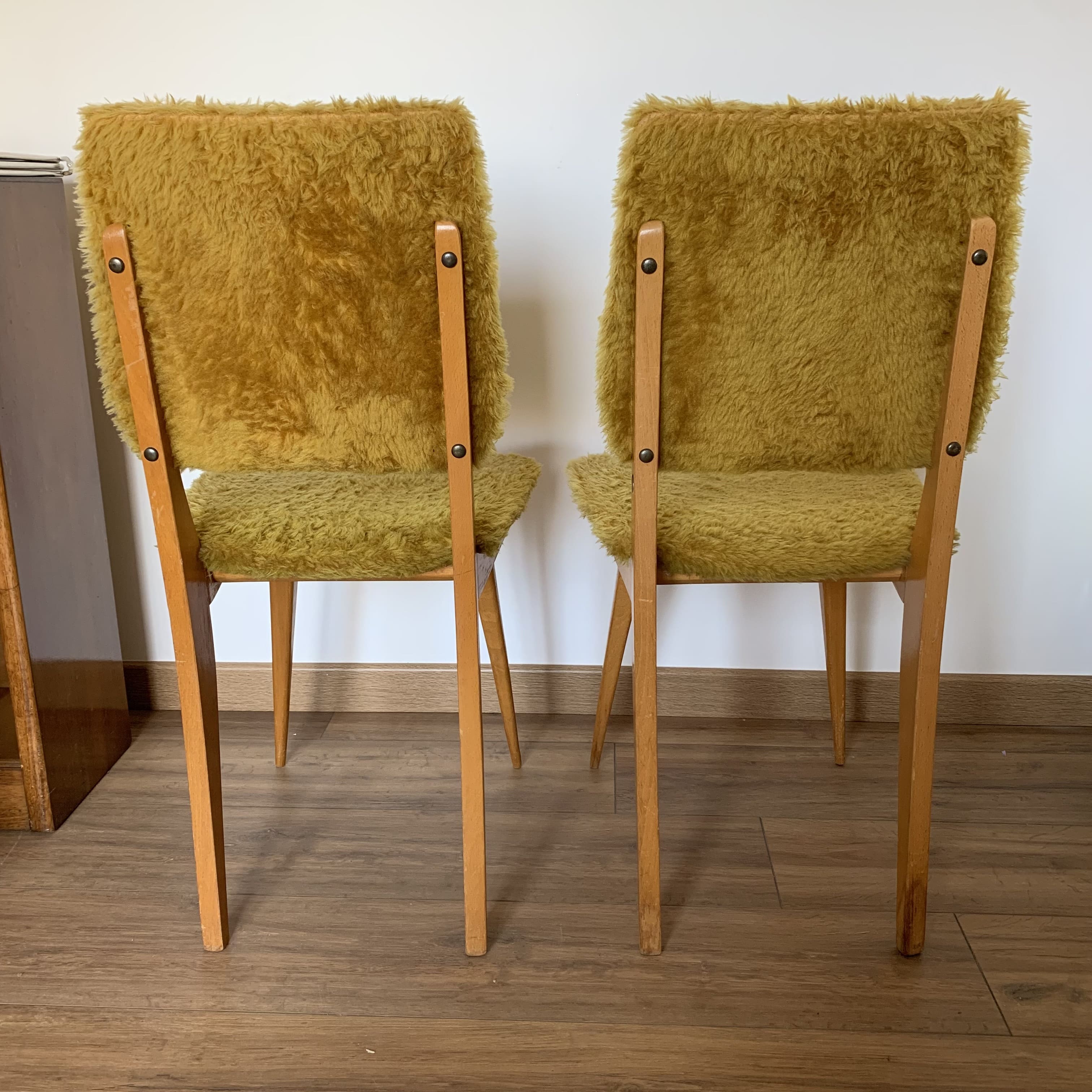2 yellow moumoute chairs